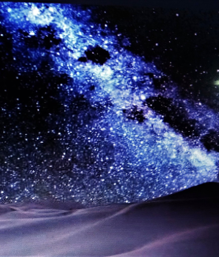 I copied the image of the milky way over the desert . When I enlarged it, I saw that it was a silent invasion of several years previous. Note the figures are falling on the sand, not behind it. These are called the Delcordiasah, vampires that were created by the evil one. Most, if not all, have gone to other planets. They were able to shape shift